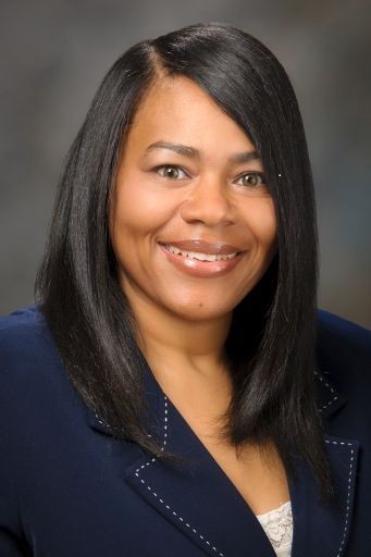 Michelene Holmes, - Board Member